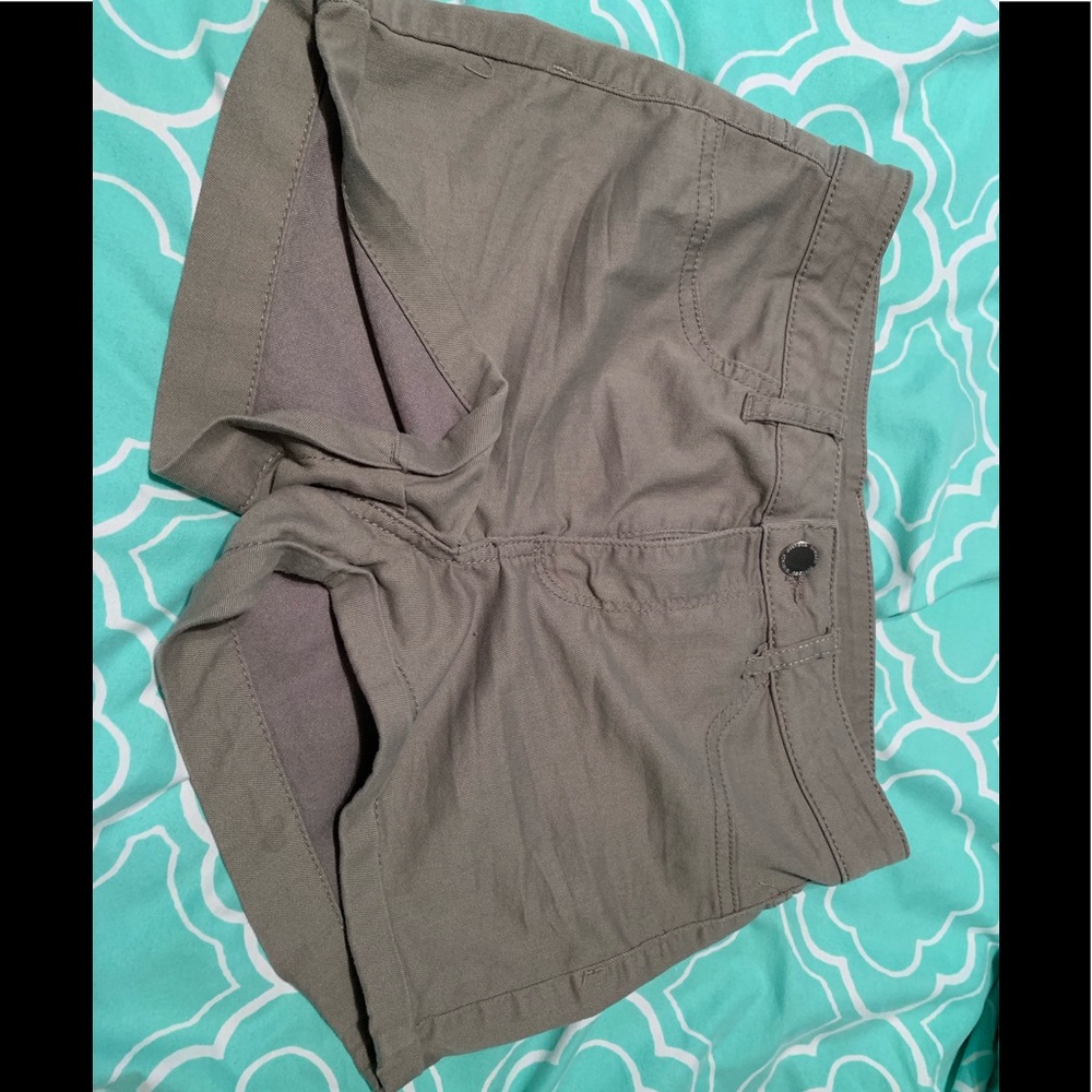 Olive green shorts.